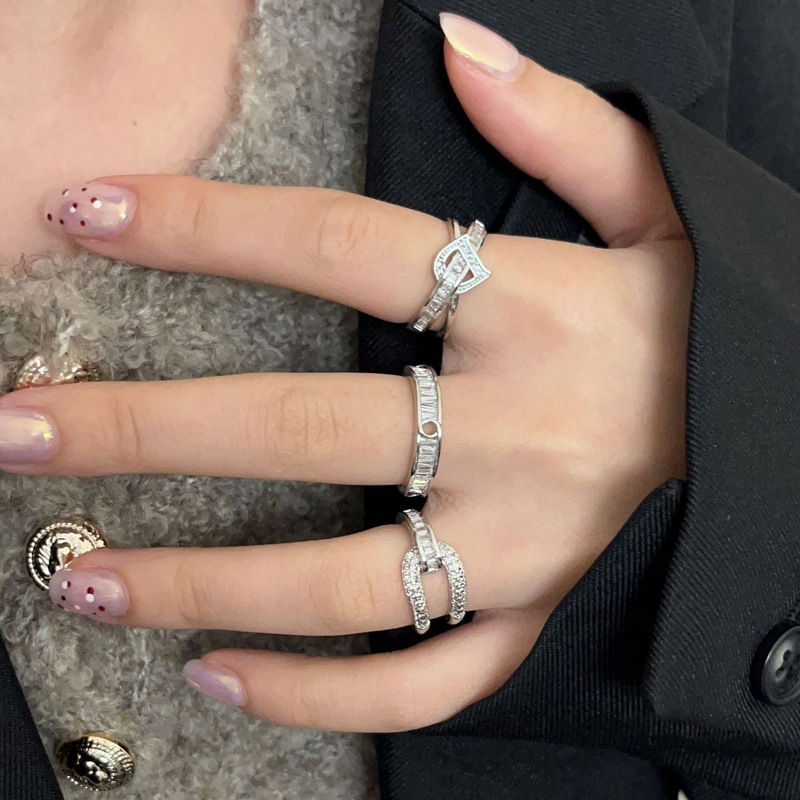 A new Korean style of layered star-shaped zircon ring for women's ins, with a cold and elegant touch and a slightly inlaid index finger opening ring trend Application Scenario