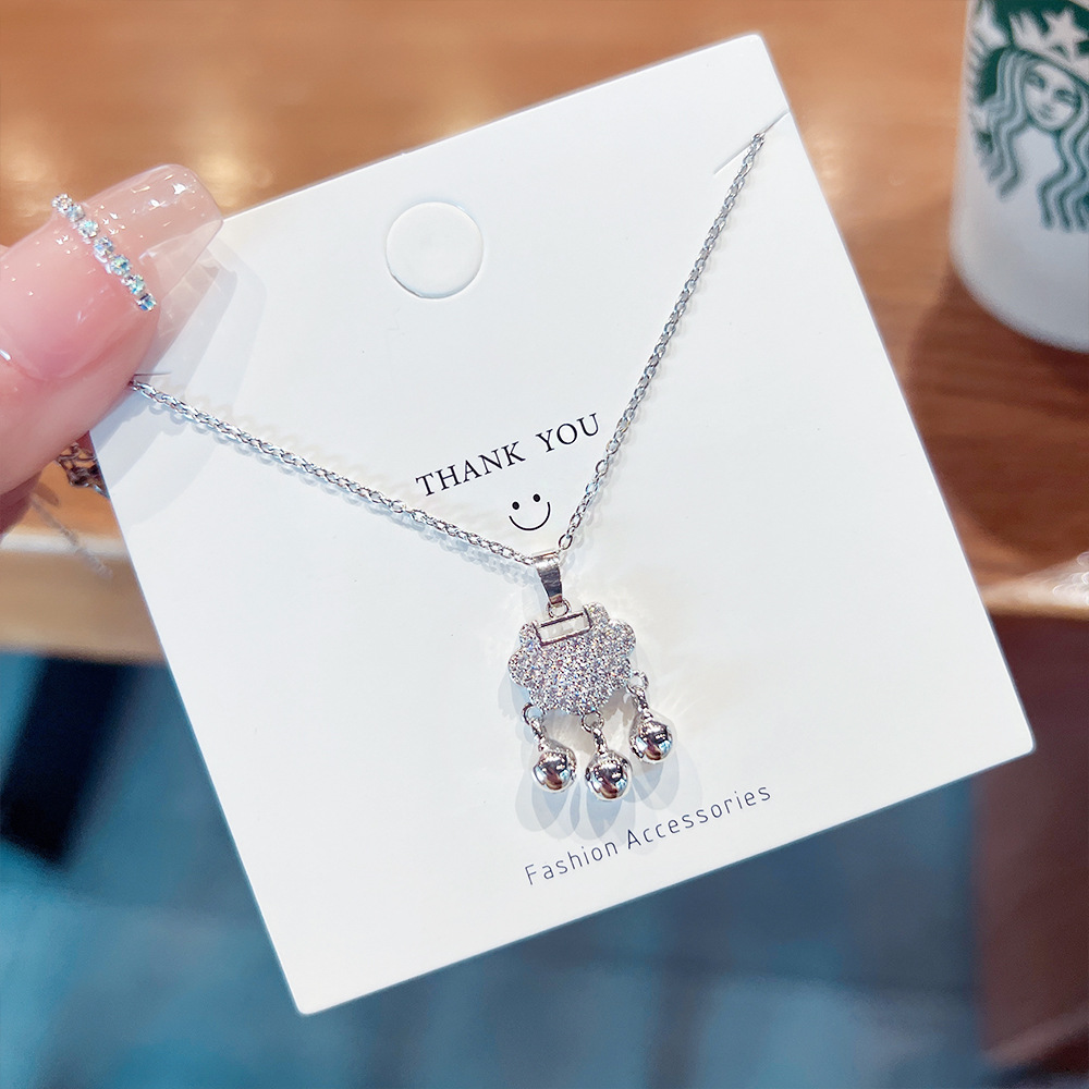 Ethnic-style ruyi peace Lock bell pendant necklace, a new niche women's collarbone chain, light luxury and simple necklace wholesale full figure