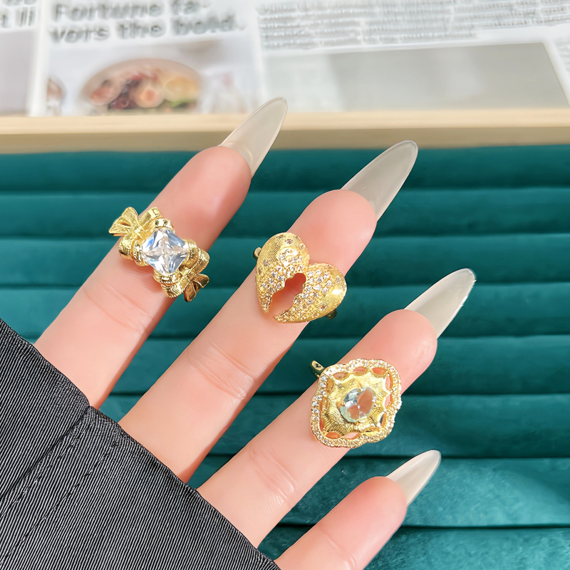 A Chinese-style pigeon egg, sea blue zircon open ring, a female heart bow, a fashionable brushed sweet and cool luxurious ring Application Scenario