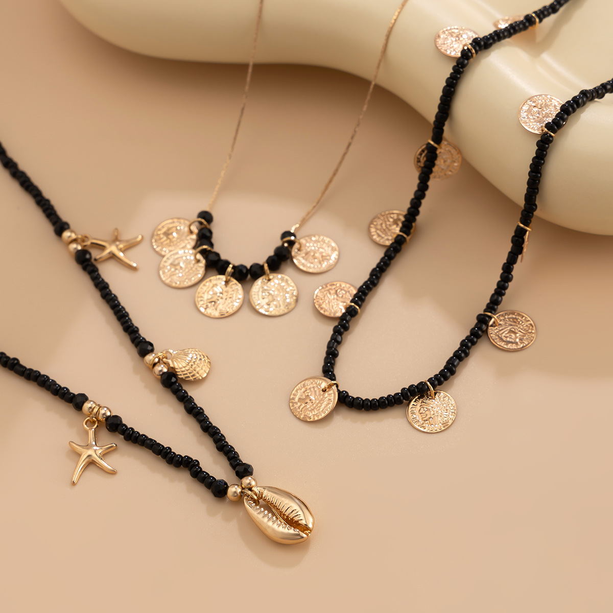 European and American cross-border jewelry vacation beach rice bead shell necklace set, fashionable alloy starfish collarbone neck chain Specification drawing