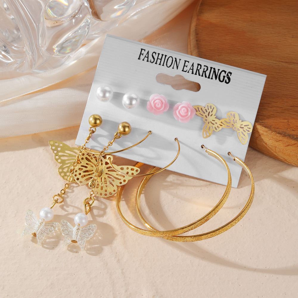European and American cross-border long tassel butterfly earrings, asymmetrical alloy pearl butterfly pendant earrings, card earrings Application Scenario