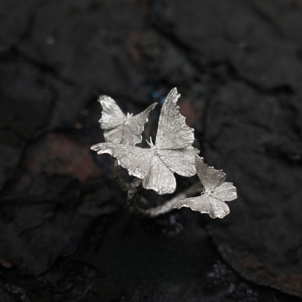 The niche design of the Butterfly Habitat Ring, a 925 sterling silver ring surrounded by butterflies, is a new Chinese-style light luxury and high-end open ring for women Item Picture