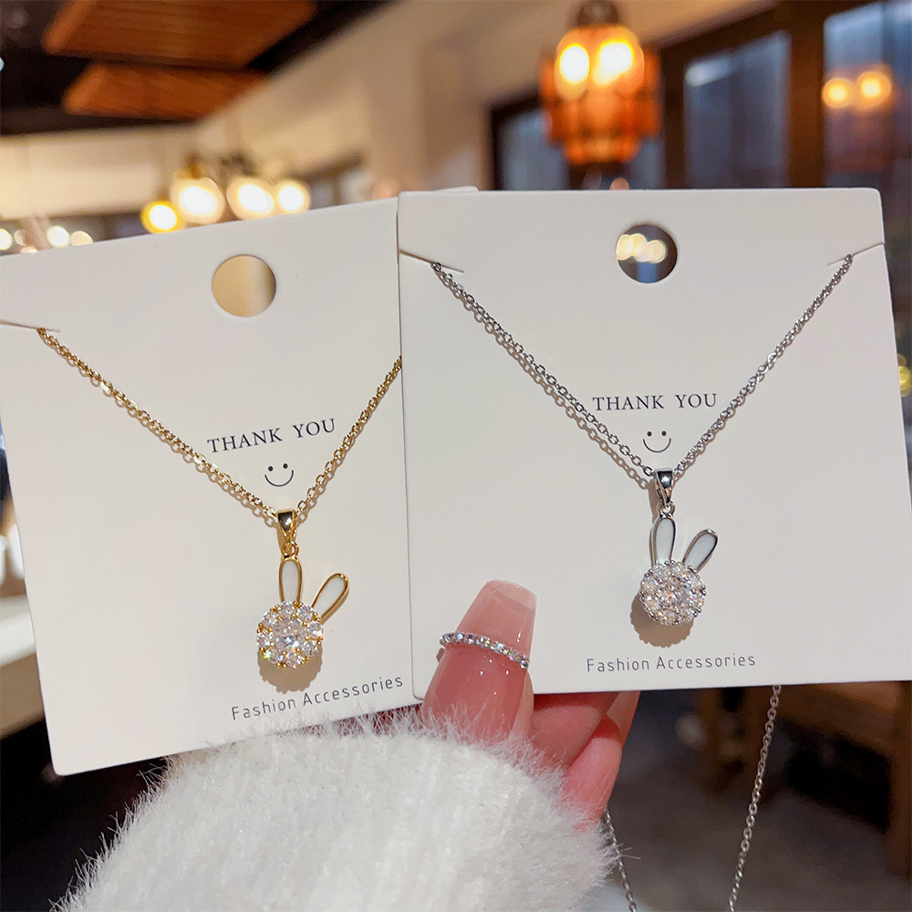 A Japanese and Korean design style rotating rabbit necklace pendant, a niche collarbone chain, a high-end and light luxury neckchain, titanium steel jewelry for women details Picture