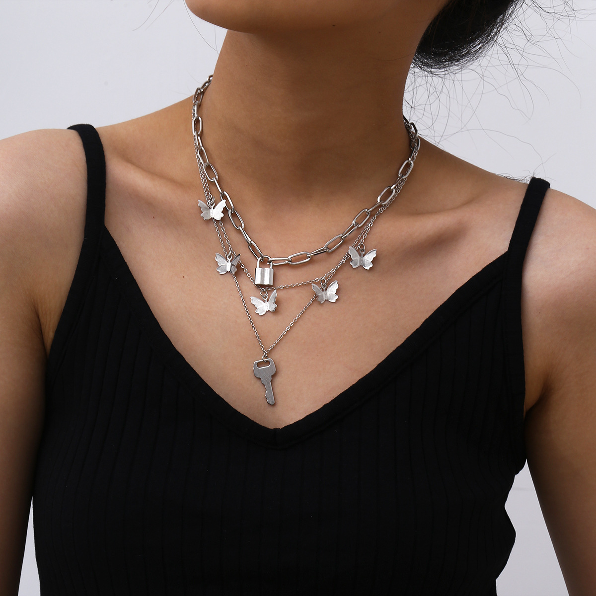 Fashionable butterfly multi-layer necklace, European and American cross-border creative lock-shaped alloy jewelry, simple key necklace full figure