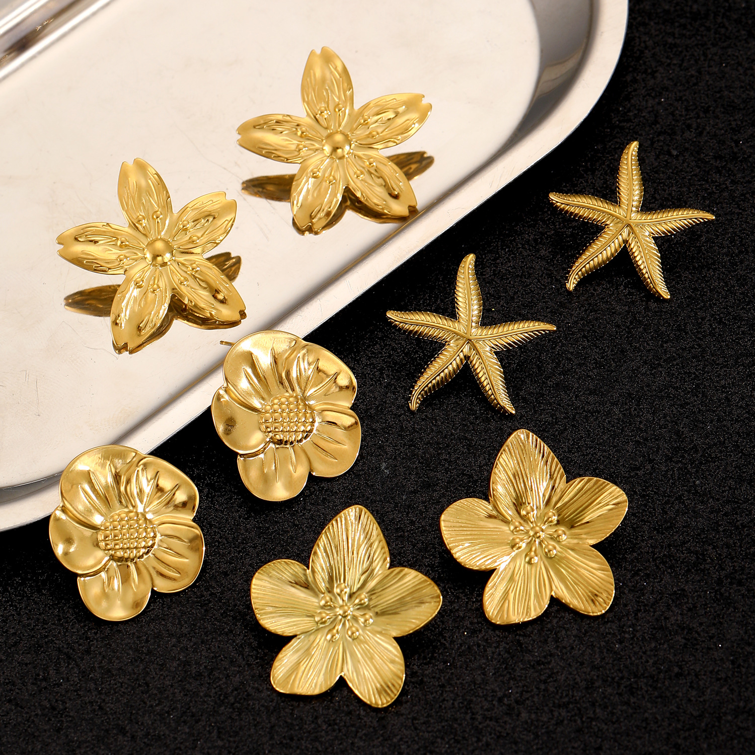 Cross-border European and American bow, flower, starfish, stainless steel stud earrings, simple commuting earrings, women's cross-border earrings wholesale Specification drawing