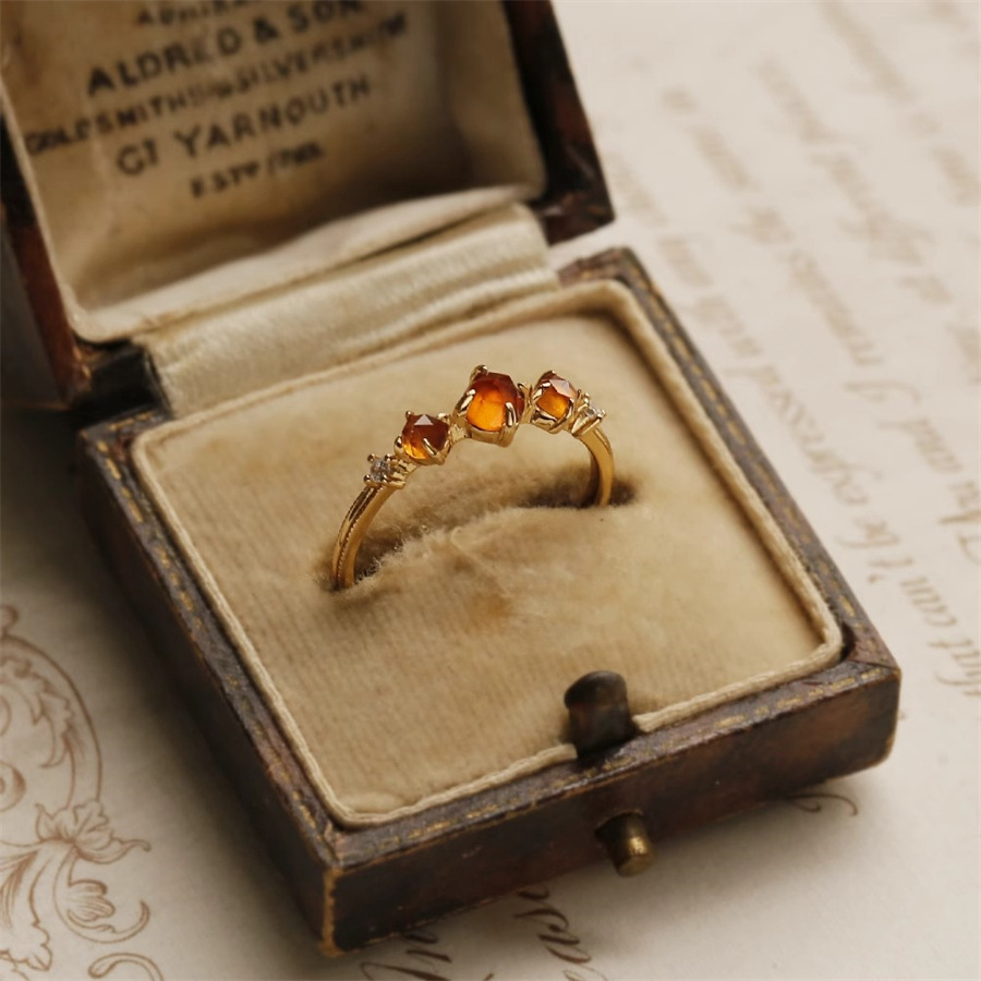 Japanese-style orange garnet ring for women, a niche retro, light luxury and high-end look, versatile gemstone open ring Application Scenario