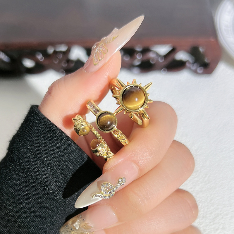 New Chinese-style retro sunflower star tiger's eye stone temperament ring, a fashionable index finger ring with a cold and unique style for women details Picture