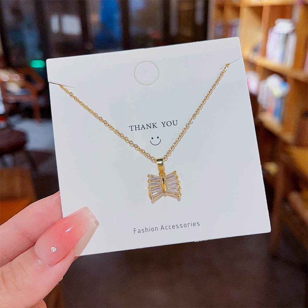 Niche design necklace, ins sweet and elegant bow titanium steel necklace, women's high-end feel, super dazzling light luxury collarbone chain Specification drawing