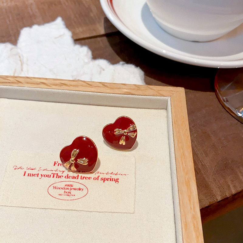 Ankela red glazed heart-shaped stud earrings for women, retro Hong Kong-style bow New Year earrings, sweet design sense earrings Application Scenario