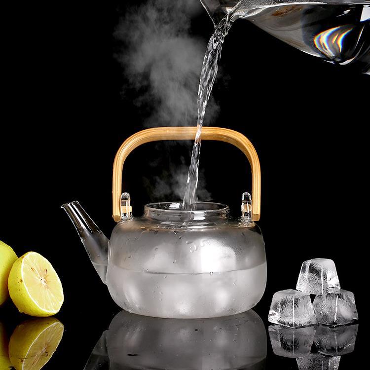 Heat-resistant glass tea brewer, steamer, kettle, black tea electric ceramic stove, tea stove, large filtering bamboo-handled teapot with a handle Application Scenario
