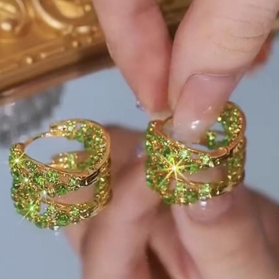 Sparkling Zircon ear loops and ear rings feature an ins trendy, high-end, niche and light luxury design. These earrings are unique, cross-border and fashionable full figure