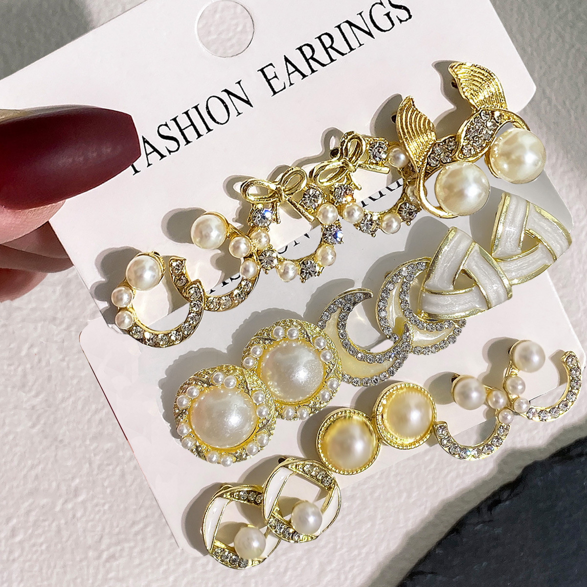 European and American cross-border ins bow fishtail pearl moon stud diamond-encrusted fashionable and elegant earring set 3-piece batch full figure