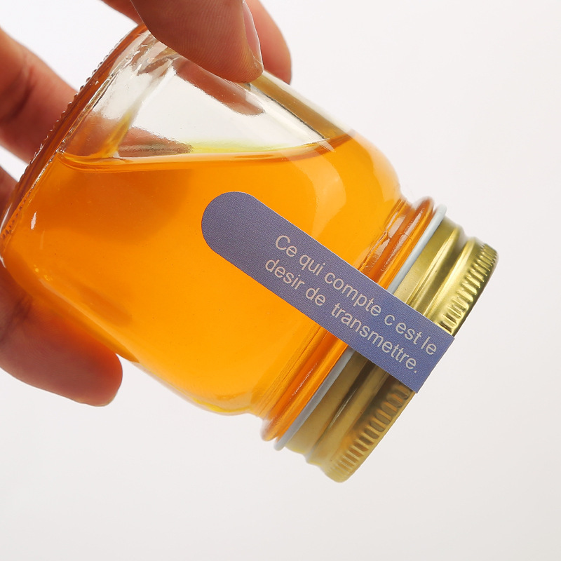 Small sealed jar with lid, high white material transparent bird's nest bottle, honey bottle, honey bottle, sealed jar, storage jar details Picture