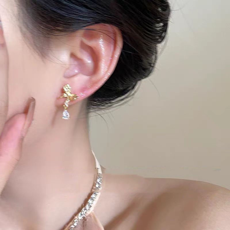 Water drop diamond bow stud earrings for women, a light luxury and high-end look, simple and versatile ear clips, a new 2025 unique and niche ear accessory details Picture