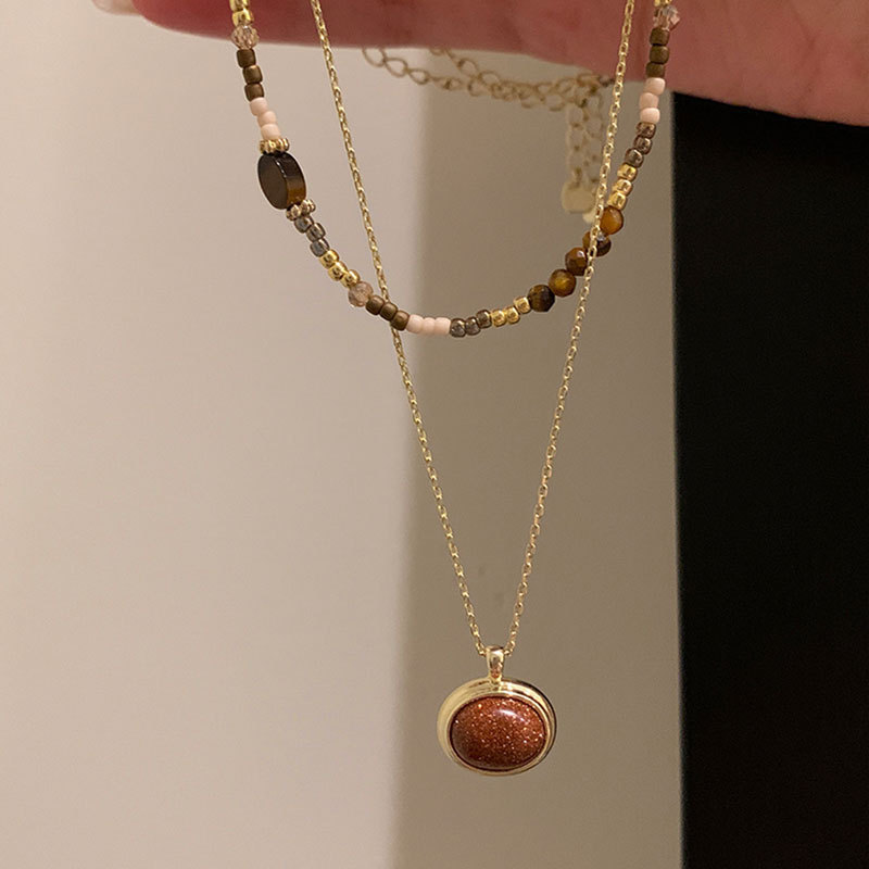 A unique and retro tiger's eye stone beaded layered necklace for women's Maillard, a fashionable and versatile necklace sweater chain Application Scenario