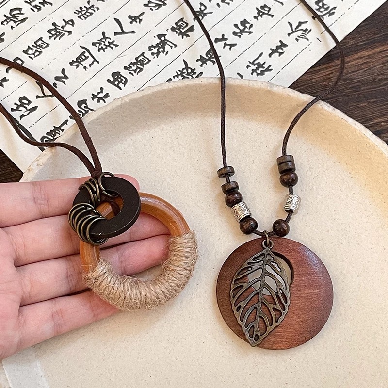 Zen-inspired Chinese-style woven rope necklace, women's Bohemian ethnic style long sweater chain, golden leaf pendant accessory details Picture