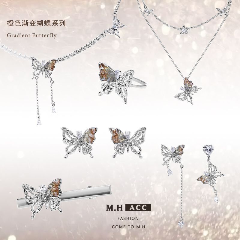 ins Orange gradient hollowed-out butterfly earrings 925 silver needle high-end stud earrings Sweet and cool style Niche design sense earrings full figure