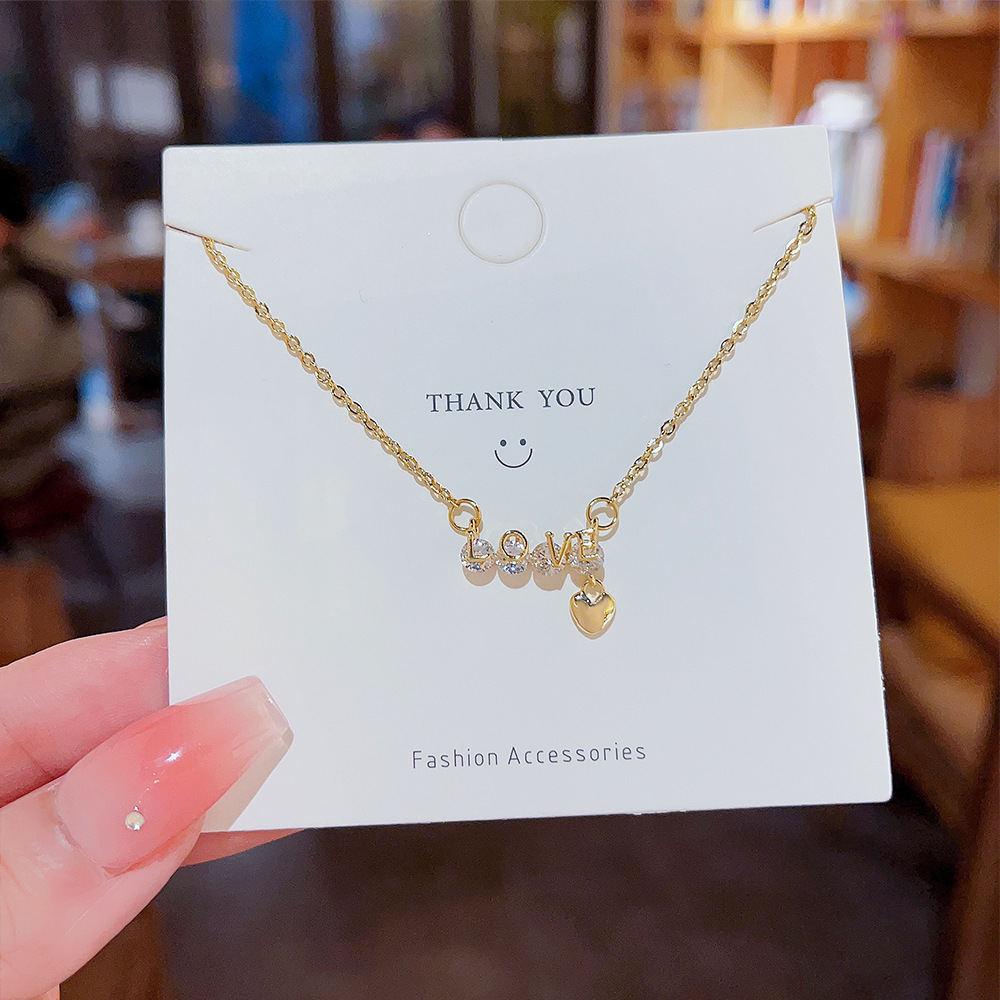 Micro-inlaid zircon heart-shaped pendant, ins-style light luxury titanium steel necklace, women's niche design, Internet celebrity bestseller, collarbone chain trend details Picture