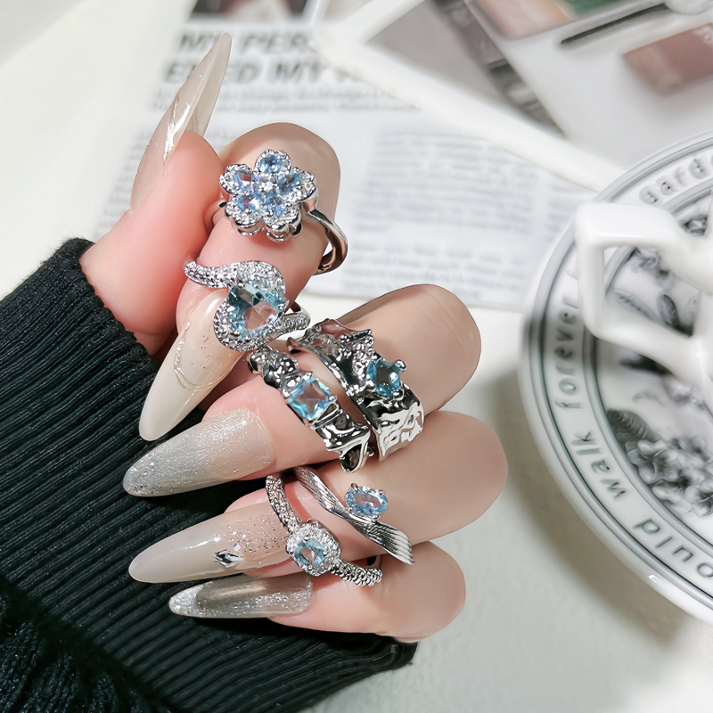 Korean-style high-end, light luxury, sea blue zircon, exquisite flower heart, fashionable ring, cold female style, niche ring trend details Picture