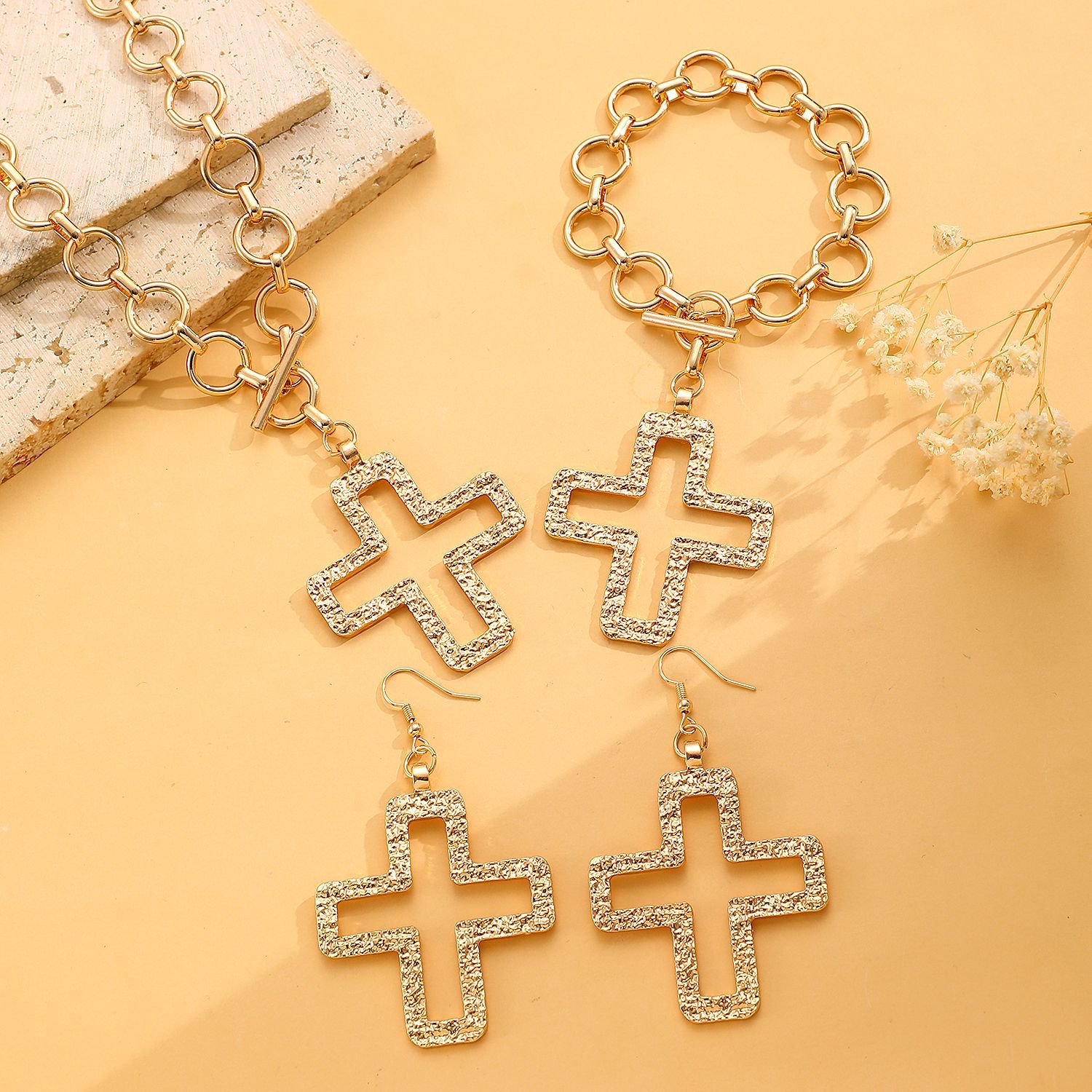 European and American style hollowed-out cross earrings, bracelet and necklace three-piece set, new cross-border Amazon chain jewelry for women Application Scenario