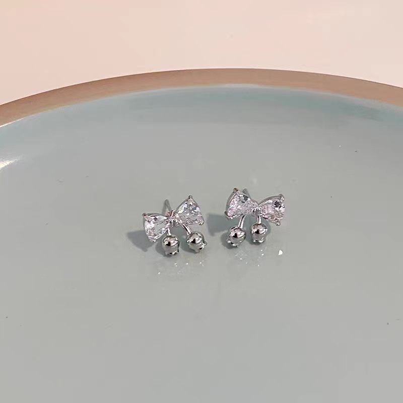 "Bang bang jump!" Gentle and refined, niche zircon bow stud earrings, 2025 new style earrings, light luxury earrings for women Application Scenario