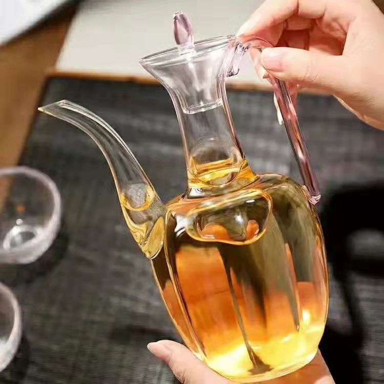 A small glass teapot in the style of the Song Dynasty, transparent for brewing green tea, a tea set for tea brewing, a household imperial concubine wine pot details Picture