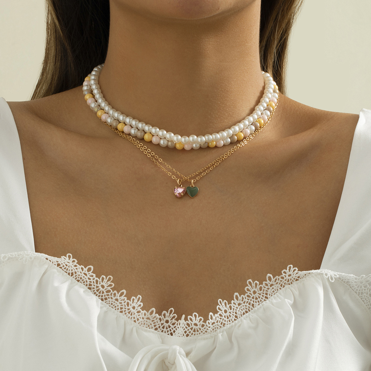 European and American cross-border retro and simple pearl alloy set necklace, personalized tassel oil drip peach heart water diamond neckpiece full figure