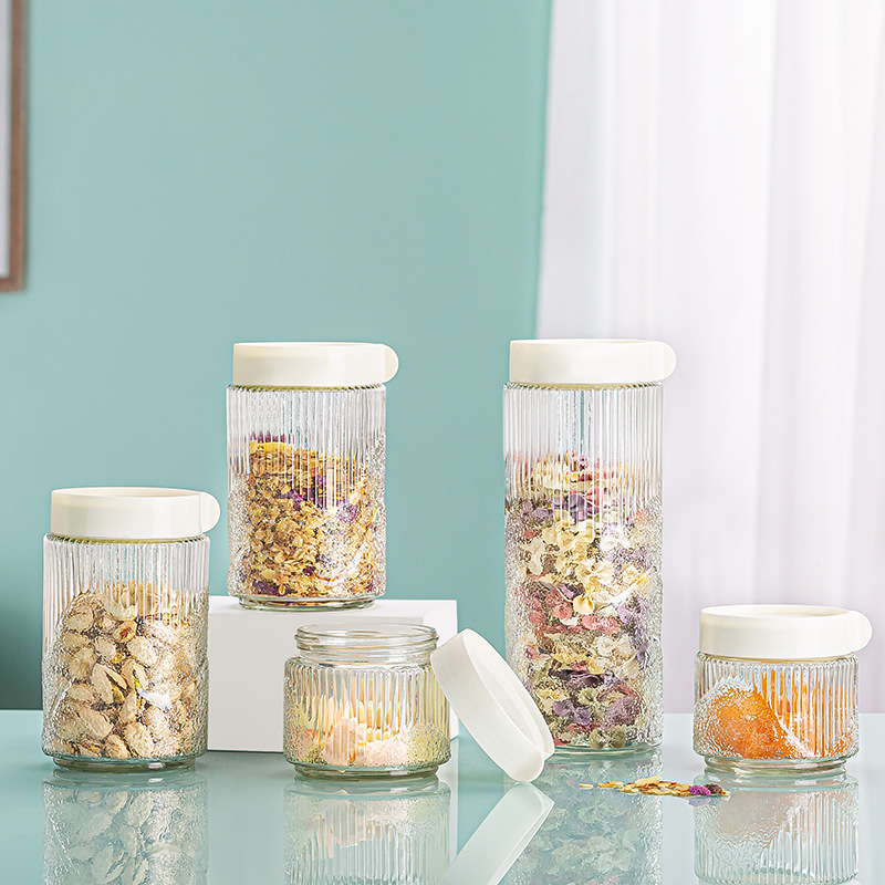 A five-piece set of transparent and sealed glass food storage containers for circular compartments of kitchen grains and cereals Specification drawing