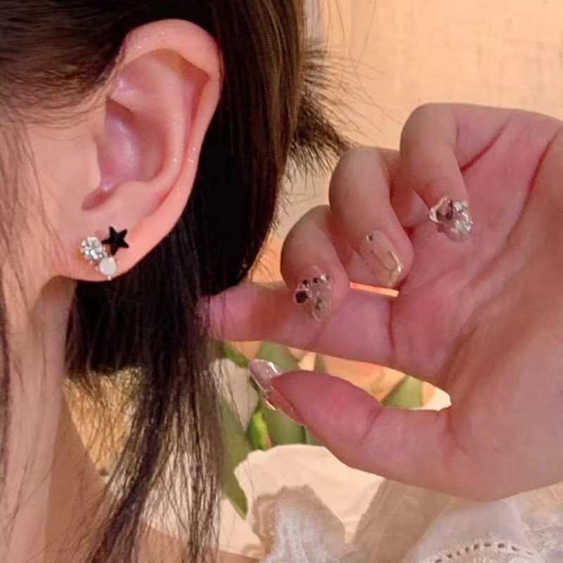 Compact and mini, with a unique ins style and niche design, black star stud earrings, sweet and cool style, spicy girl ear bone stud earrings for women details Picture