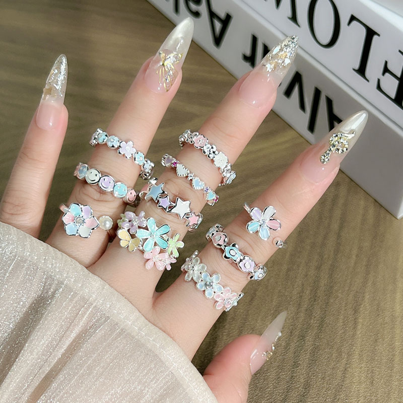 The new summer dopamine colorful enamel flower sweet ring for women's layered wear, a gentle style, light luxury and niche accessory trend Specification drawing