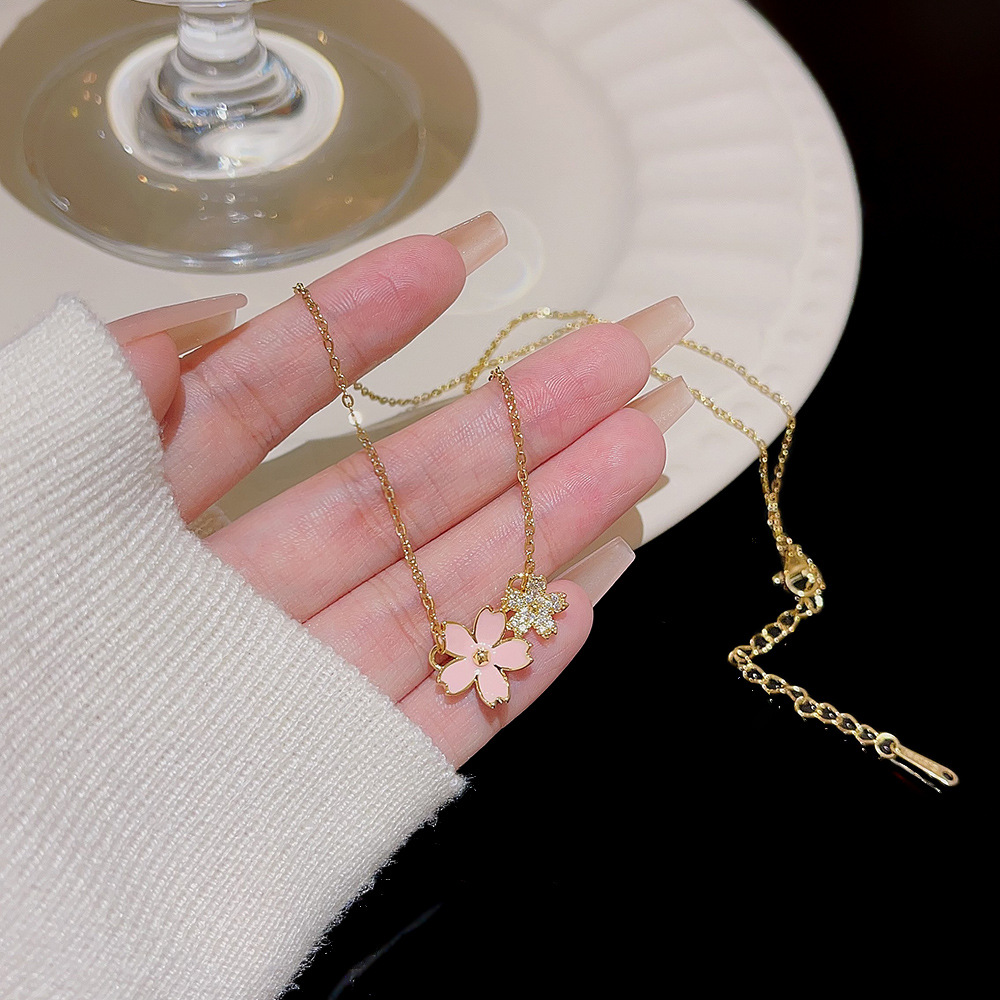 A light luxury and sweet cherry blossom pendant necklace, a versatile and niche design with an InS-style petal collarbone chain necklace accessory Application Scenario
