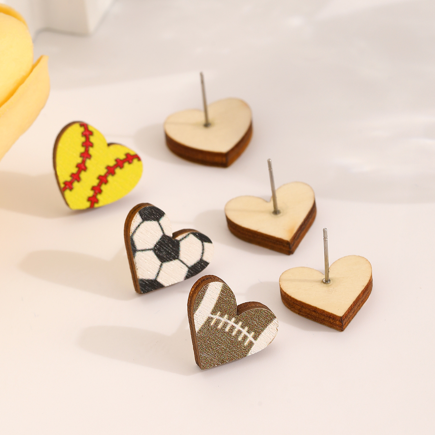 Cross-border fashion and love volleyball, football, basketball, rugby events, sports ball games, black ear studs, simple earrings for women Application Scenario