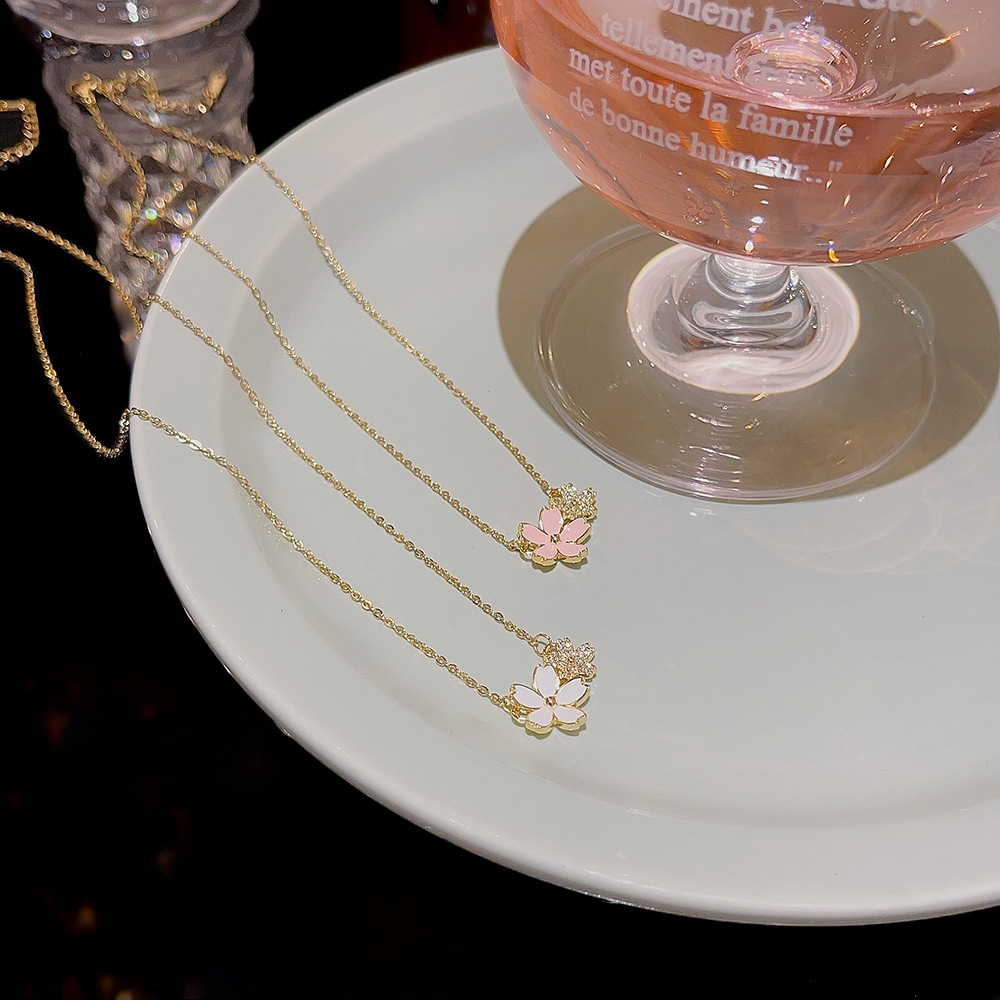 A light luxury and sweet cherry blossom pendant necklace, a versatile and niche design with an InS-style petal collarbone chain necklace accessory full figure