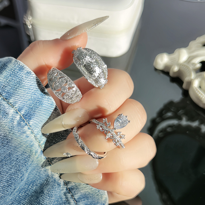 Simple and individual crown, water-drop zircon light luxury open ring, women's niche high-end lace full diamond fashionable ring full figure