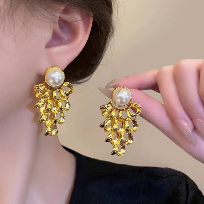 vintage style imitation pearl hollowed-out gold earrings, retro exaggerated palace stud earrings, unique earrings for women full figure