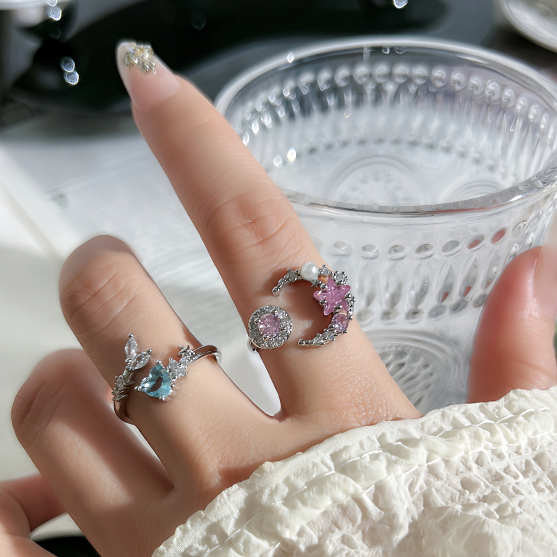 A sweet and stylish fishtail fashion ring with a touch of elegance, a light luxury and cold style for women, a star and moon pink diamond index finger ring details Picture