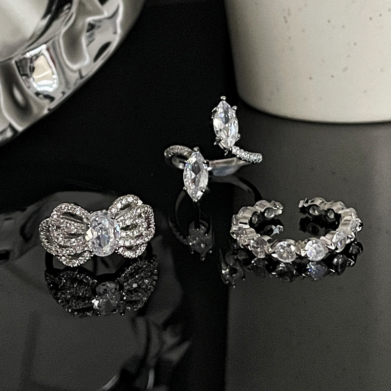 A light luxury and high-end full-diamond zircon bow open ring for women's ins, with a cold style, individual temperament and fashionable charm full figure