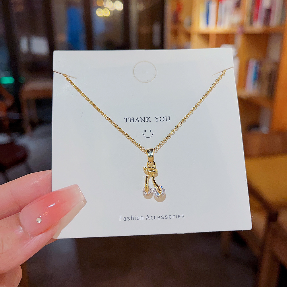 Japanese and Korean style small cherry micro-inlay zircon titanium steel necklace, feminine and individual collarbone chain, simple and niche accessory necklace Specification drawing