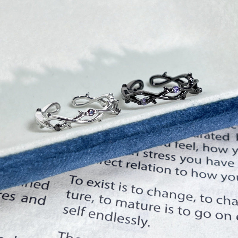 A simple Korean-style dark and distinctive open-top ring wrapped around branches, a high-end and cold style couple's index finger ring trend Specification drawing