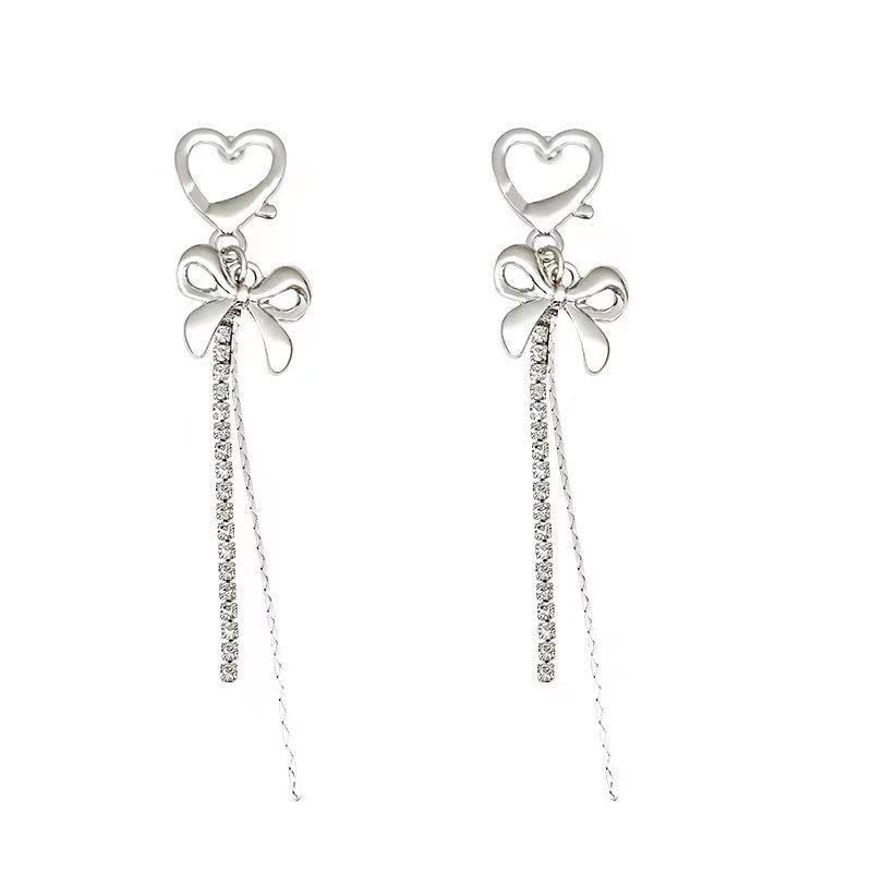 Fashionable and versatile heart-shaped tassel stud earrings for women, light luxury and niche bow pendant earrings, 2025 new trendy earrings Item Picture