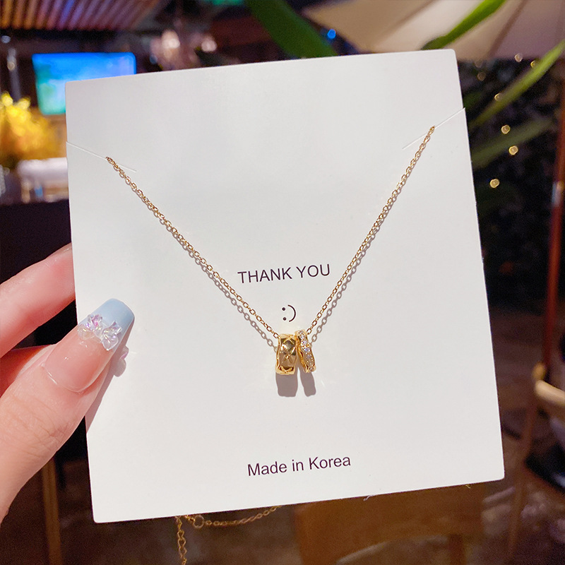 Japanese and Korean geometric light luxury necklace, niche design sense, titanium steel collarbone chain, high-end sense, zircon pendant, sweater chain for women Application Scenario
