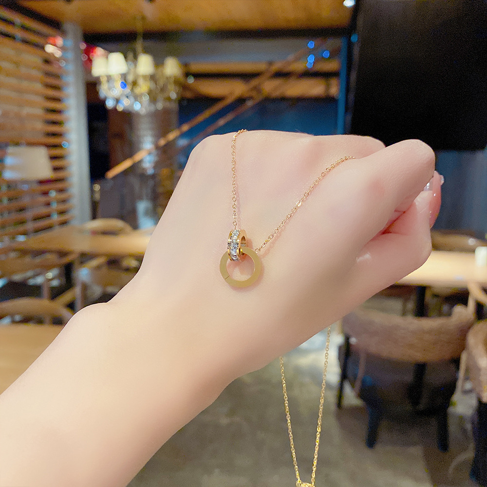 This light luxury and niche design necklace does not fade. It features a Korean-style creative double-ring collarbone chain with a fashionable and ladylike style details Picture