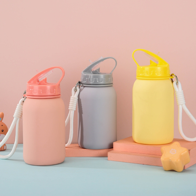 Sports outdoor silicone water bottle, children's travel water cup, portable folding new macaron cute compressed water bottle full figure