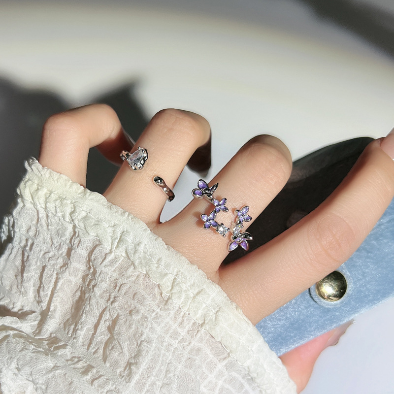 The Korean version of the super fairy-like purple three-dimensional flower opening ring for women, with water drop and diamond inlays, is a light luxury and exquisite versatile ring trend full figure