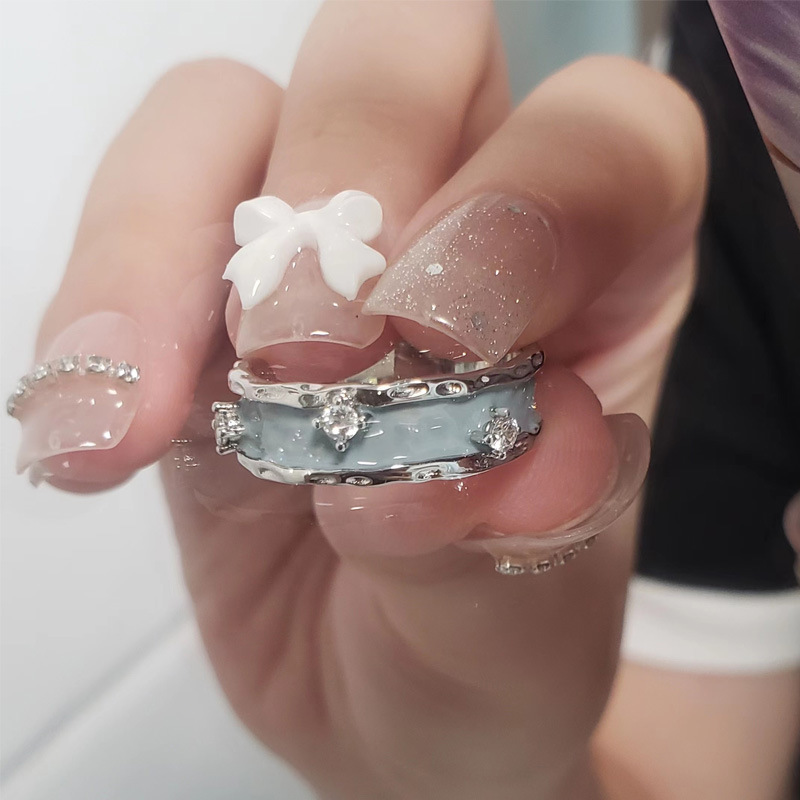 The texture enamel drop glaze is a niche design with a high-end feel. It's a trendy 2022 new style index finger ring for women with an open adjustment details Picture