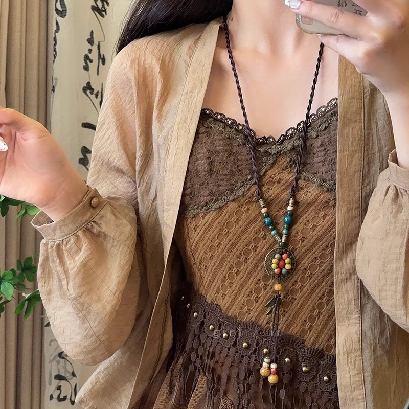 Retro Bohemian-style ceramic braided rope necklace for women, new Chinese ethnic style, niche and Zen-inspired sweater chain full figure