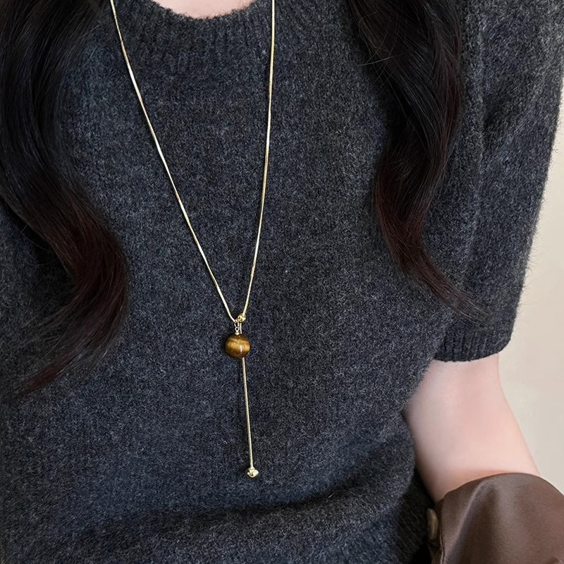 Korean Maillard Tiger cat eye stone collarbone chain 2024 autumn/Winter long sweater chain feel retro personality necklace full figure