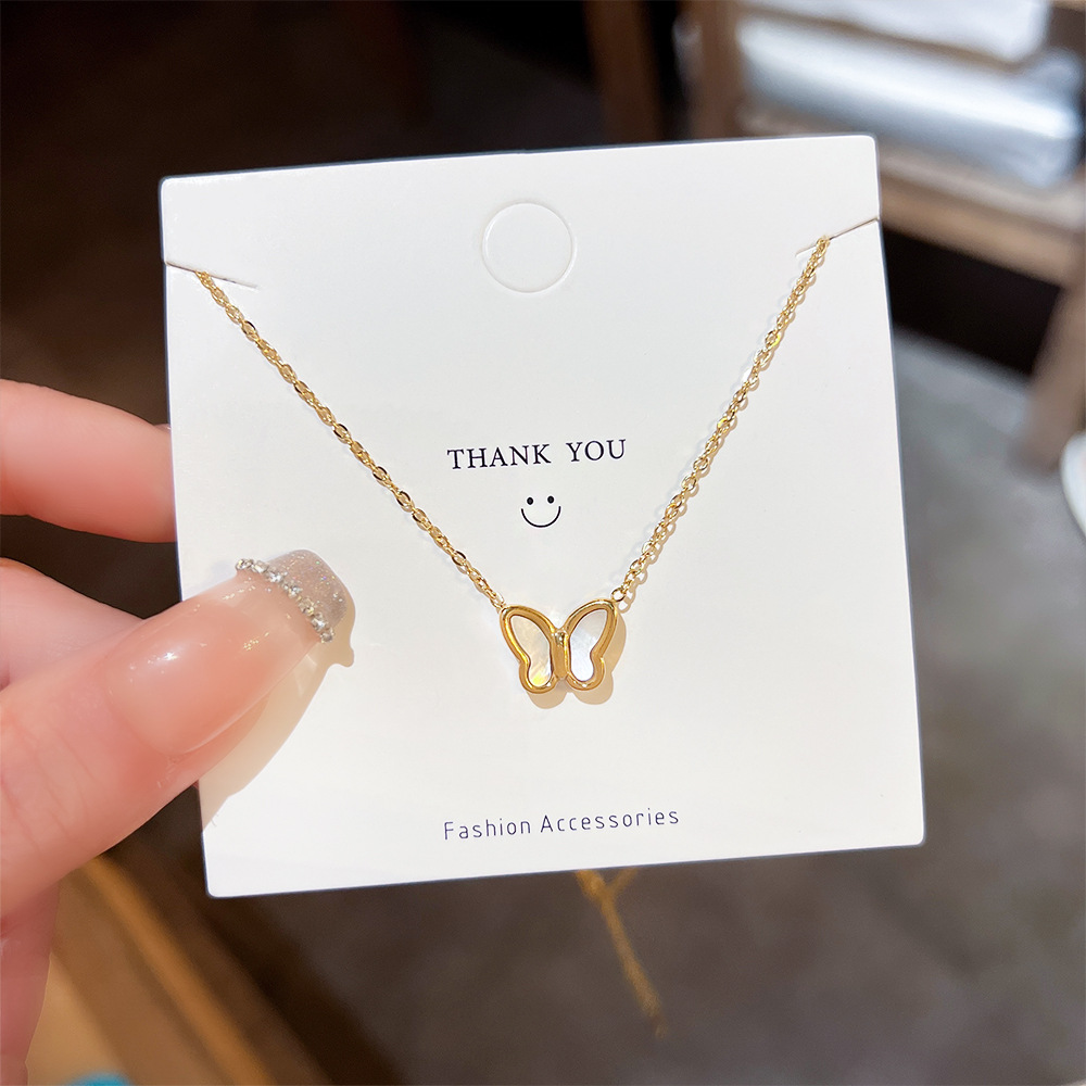 Korean version white mother-of-pearl butterfly necklace, women's niche design sense pendant, light luxury titanium steel collarbone chain, one hair replacement accessory Specification drawing