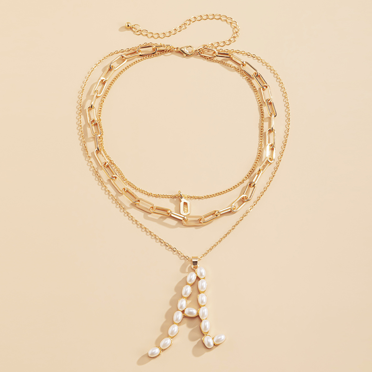Geometric letter-encrusted pearl multi-layer necklace, hip-hop trendsetter fine chain necklace, European and American cross-border snow soft accessories details Picture