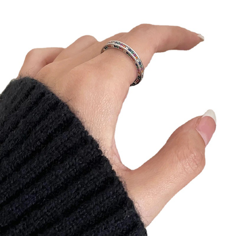 A niche, light luxury, colorful, diamond-encrusted, versatile zircon ring for women, with a fashionable, individualistic and elegant design. It's an open ring with a high-end feel Item Picture